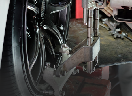 Mechanic Is Aligning Car's Wheel